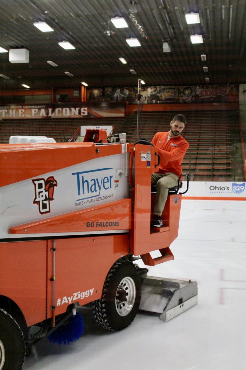 Luke Bodeis takes the Zamboni for a spin to maintain the ice