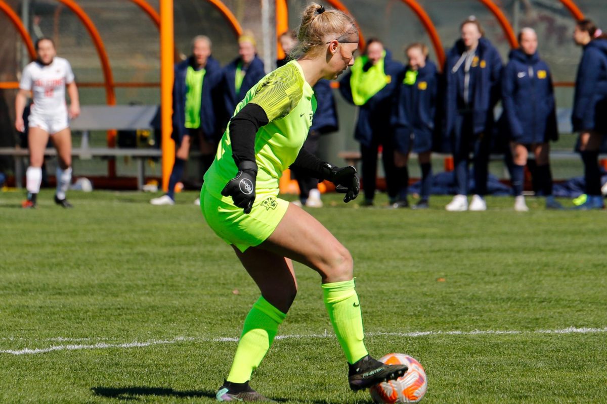 Bowling Green, OH - Falcons Freshman Goalkeeper Payton O'Malley (1) going to kick the ball to an open teammate after making a save at Cochrane Stadium in Bowling Green, Ohio