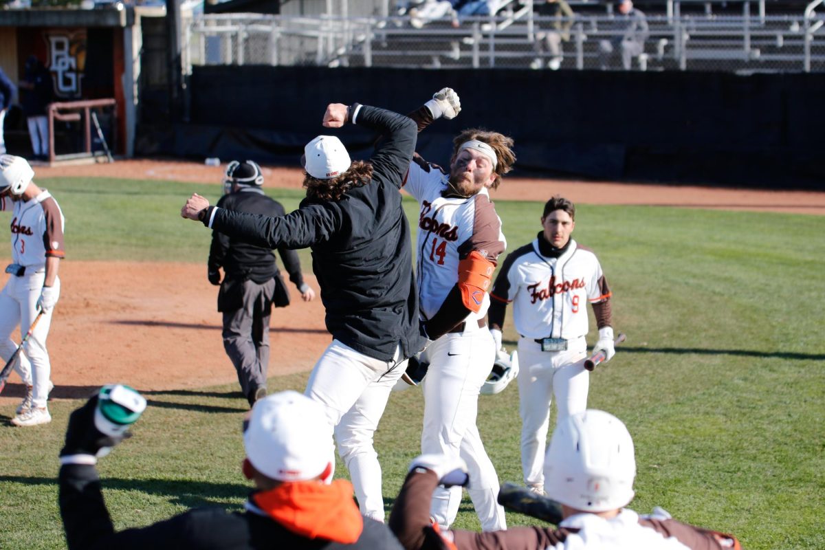 Bowling Green, OH - BGSU bench celebrating Gavin Ganuns (14) grand slam to put the team ahead in the eighth inning at Steller Field in Bowling Green, Ohio