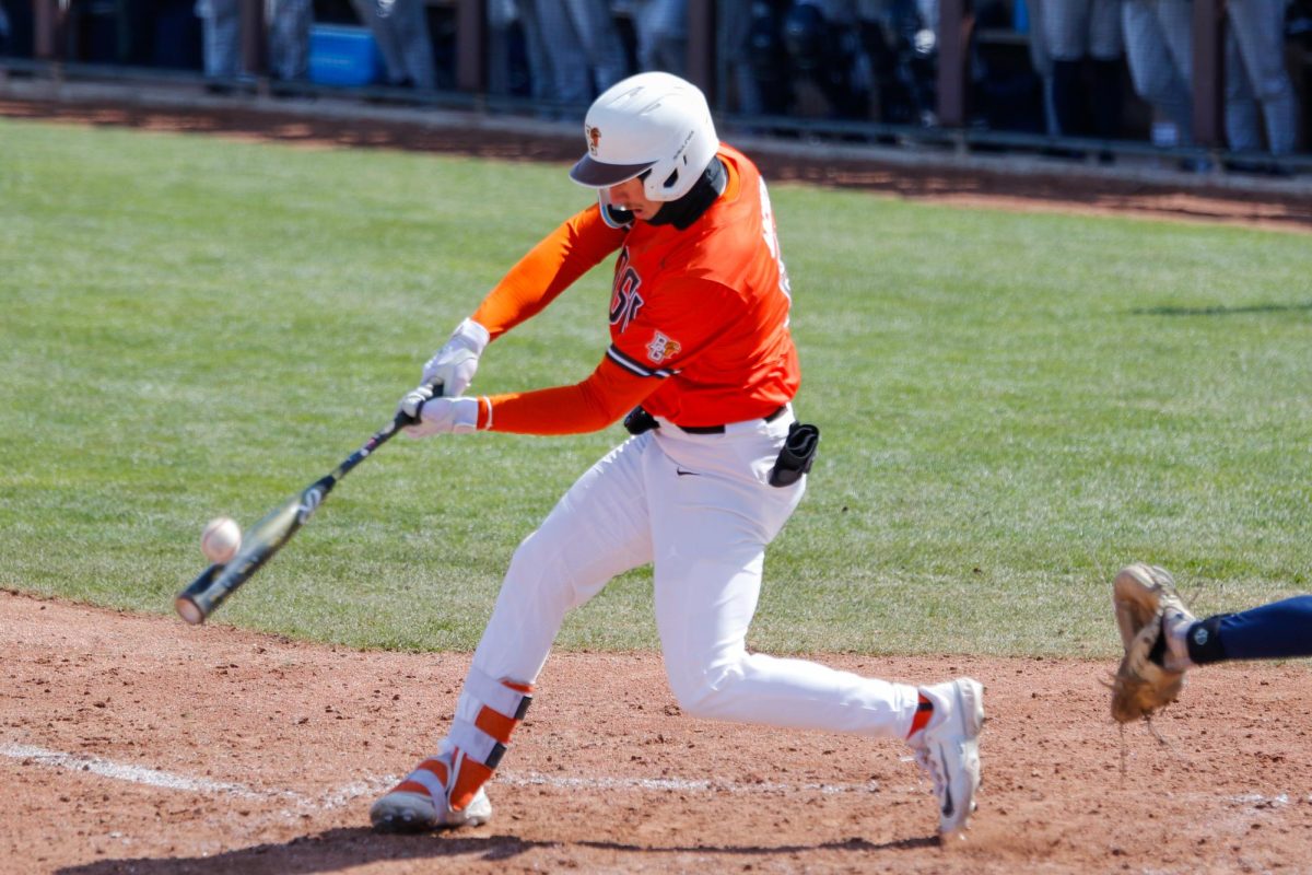 Bowling Green, OH - Falcons Junior Outfielder Nathan Archer (8) hit the ball at Steller Field in Bowling Green, Ohio