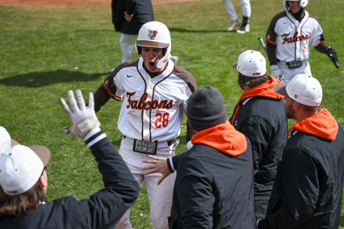Bowling Green, OH - Falcons sophomore designated hitter DJ Newman (28) celebrating with the dugout after his homerun at Steller Field in Bowling Green. Ohio