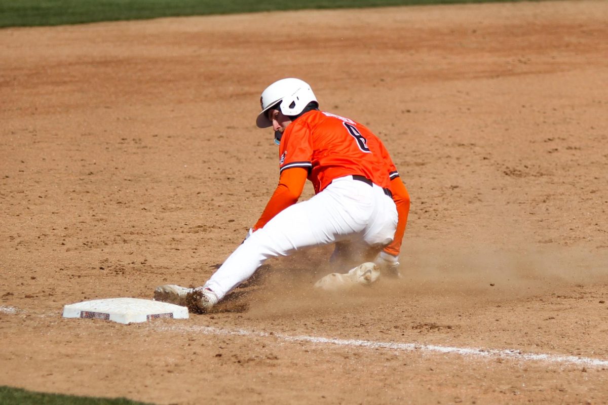 Bowling Green, OH - Falcons Junior Outfielder Nathan Archer (8) sliding into third base at Steller Field in Bowling Green, Ohio