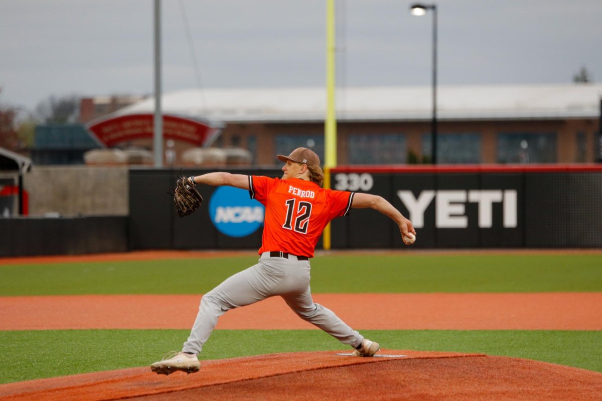 Columbus, OH - Falcons Pitcher Connor Penrod (12) about to pitch the ball for a strike at Bill Davis Stadium in Columbus, Ohio