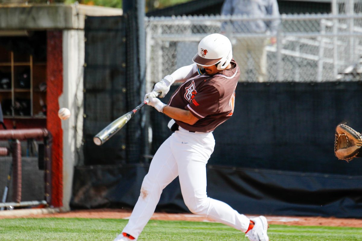 Bowling Green, OH - Falcons Infielder Sam Seidel (21) just hit the ball at Steller Field in Bowling Green, Ohio 