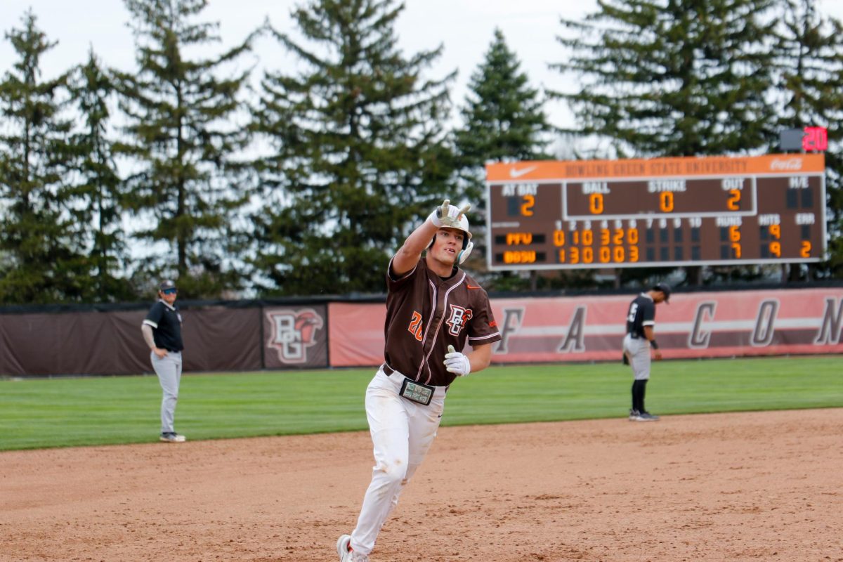 Bowling Green, OH - Falcons Designated Hitter DJ Newman (28) coming around third base in celebration after his homerun at Steller Field in Bowling Green, Ohio 