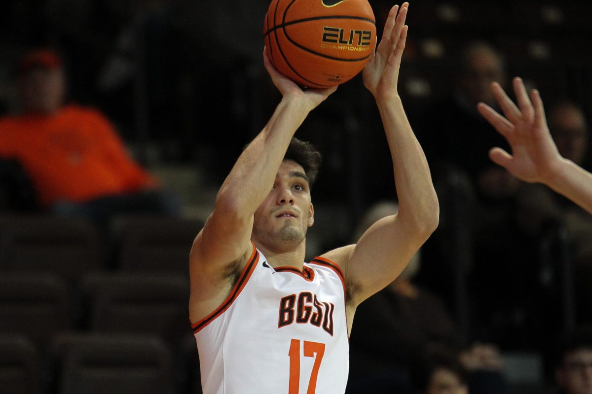 Bowling Green, OH - Falcons Sophomore Guard JZ Zaher (17) going up for a 3-pointer at Stroh Center in Bowling Green, Ohio.