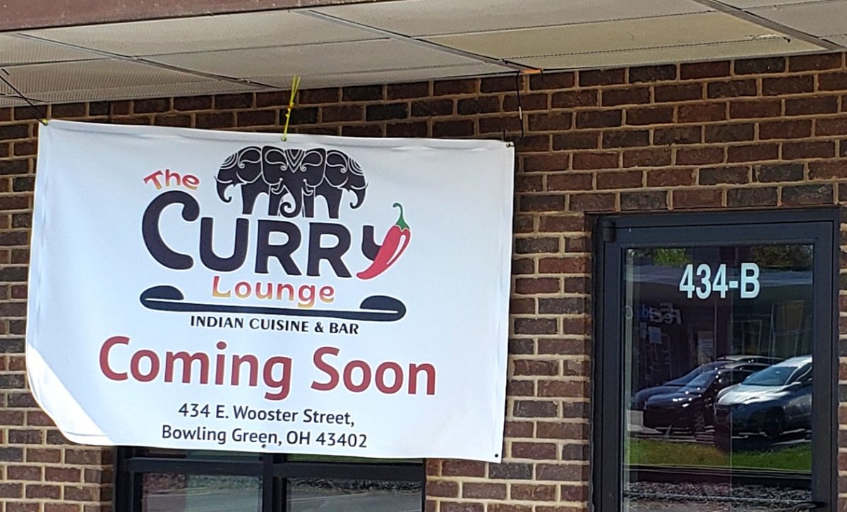 A banner announces The Curry Lounge will soon open at 434 East Wooster, former home of Guajillos Cocina Mexicana.