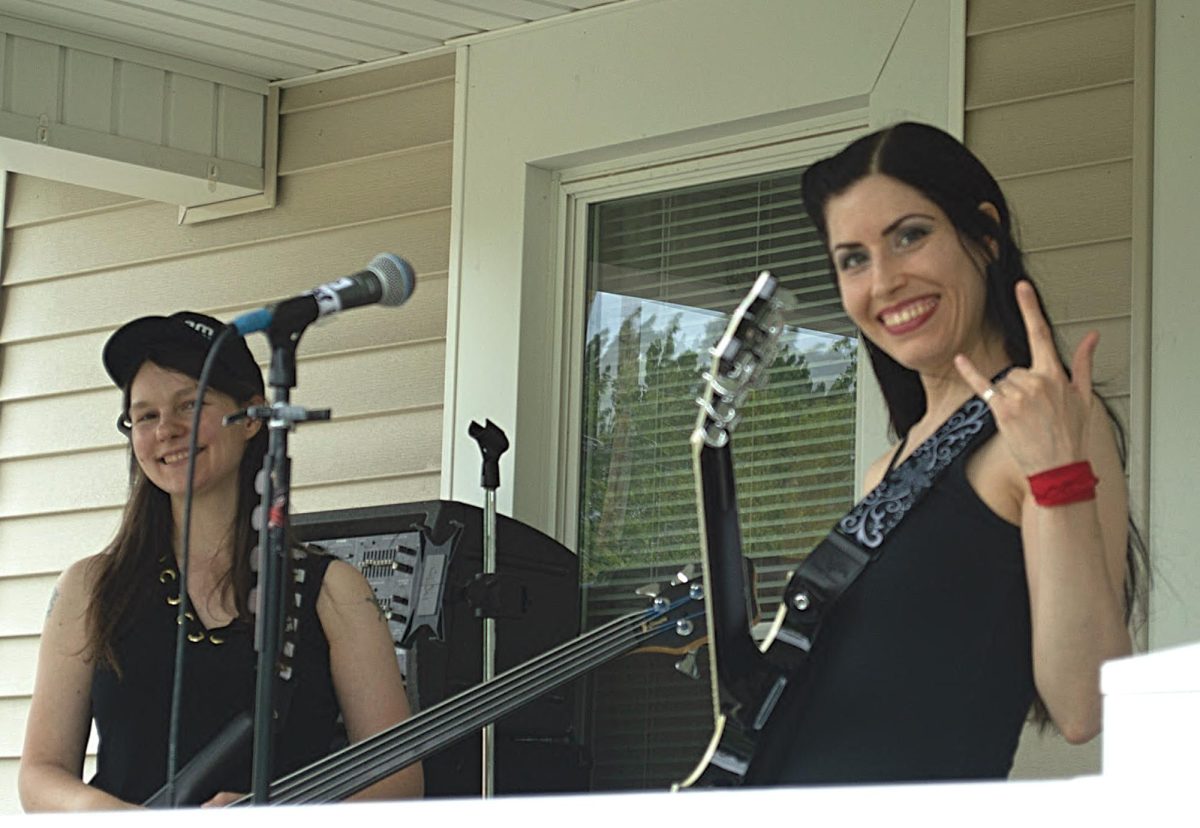 The lead singer of Rose Cora Perry and The Untold Truths said she promised Porchfest 2024 organizers the group would be loud and have fun. The Canadian trio made good on both promises. 