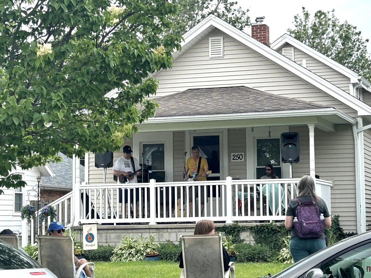 The Extras perform at 250 Eberly Ave. during Porchfest 2024. 