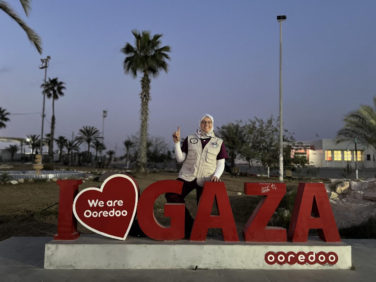 Dr. Jomana Al-Hinti poses with the ‘I love Gaza’ sign in Rafah on May 1. Courtesy of Al-Hinti.