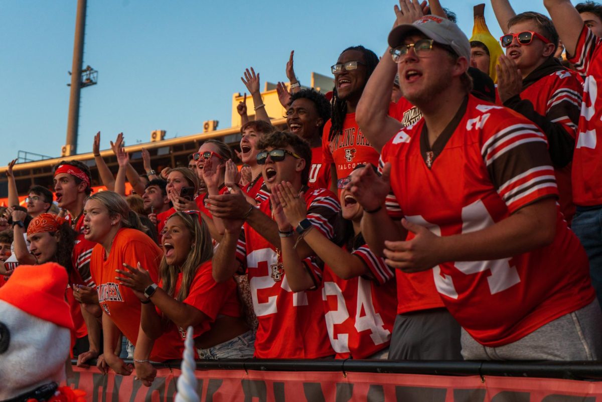 Bowling Green, OH - Student Section celebrates senior quarterback Connor Bazelak (7) scores a touchdown in the second quarter at Doyt Perry Stadium in Bowling Green, Ohio.