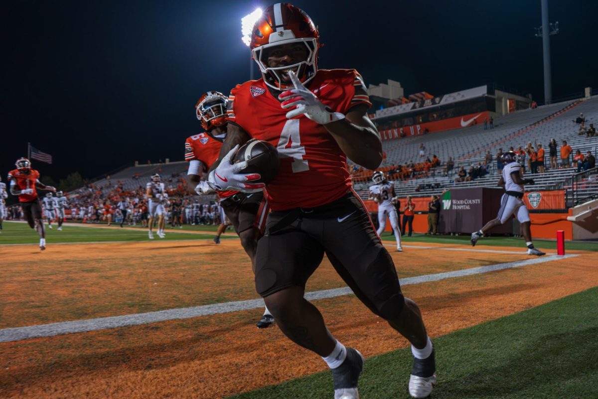 Bowling Green, OH - Falcons junior running back Terion Stewart (4) celebrates after scoring his third and final touchdown in the fourth quarter at Doyt Perry Stadium in Bowling Green, Ohio.