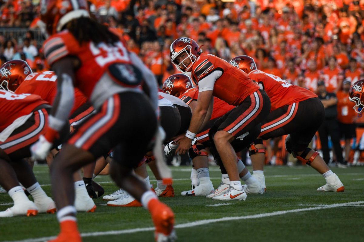 Bowling Green, OH - Falcons senior quarterback Connor Bazelak (7) calling his players in motion at Doyt Perry Stadium in Bowling Green, Ohio.