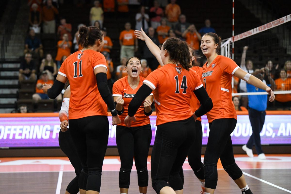 Bowling Green, OH - Falcons celebrating after starting off their season with a win at Stroh Center in Bowling Green Ohio