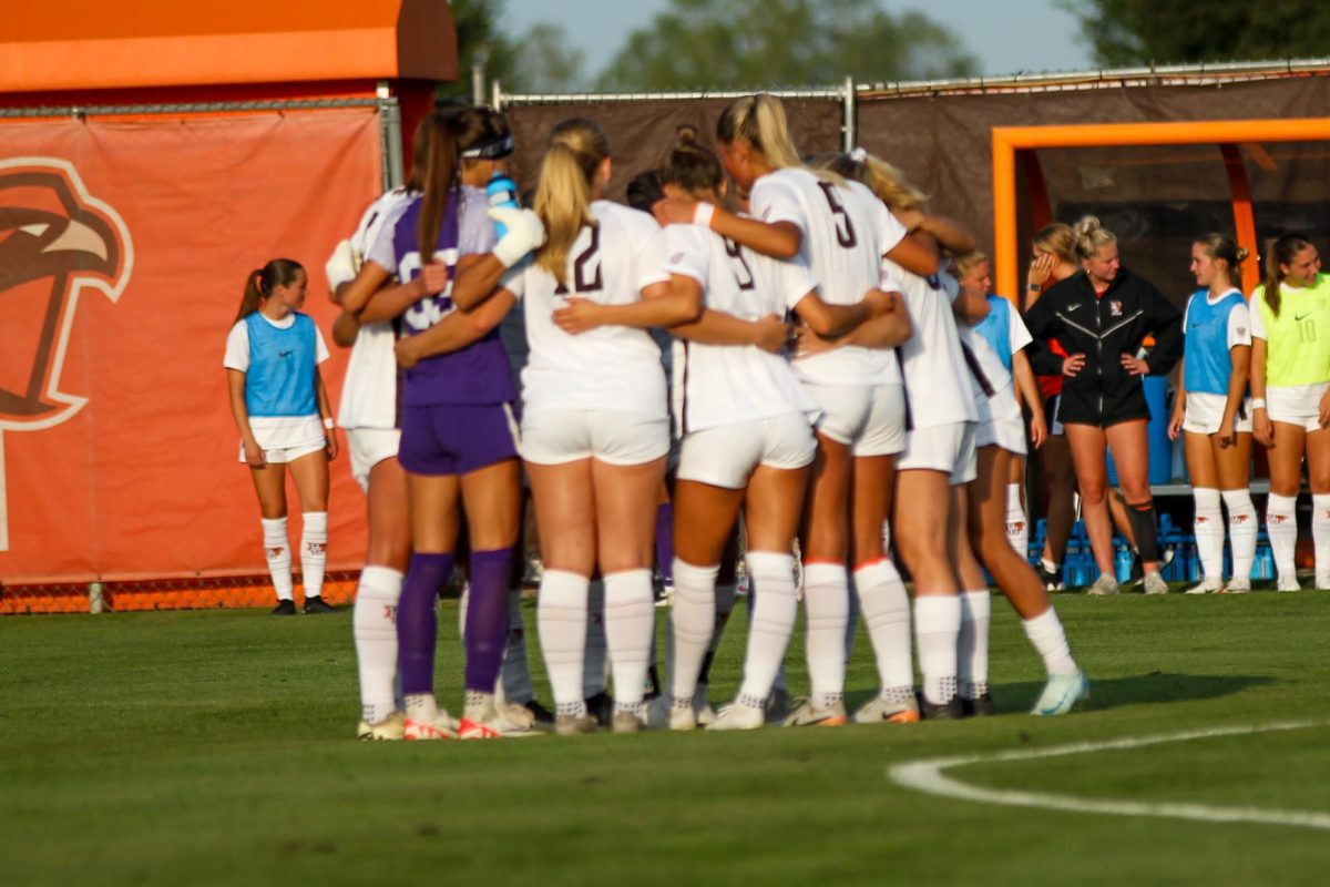 Bowling Green, Ohio - Falcons team huddle before the game starts at Cochrane Field, Bowling Green