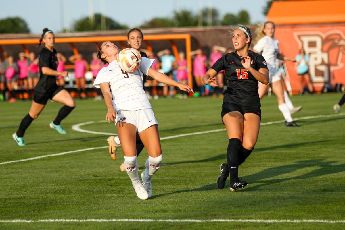 Bowling Green, Ohio - Falcons Junior Forward Brynn Gardner (9) blocking the ball with her chest at Cochrane Field, Bowling Green