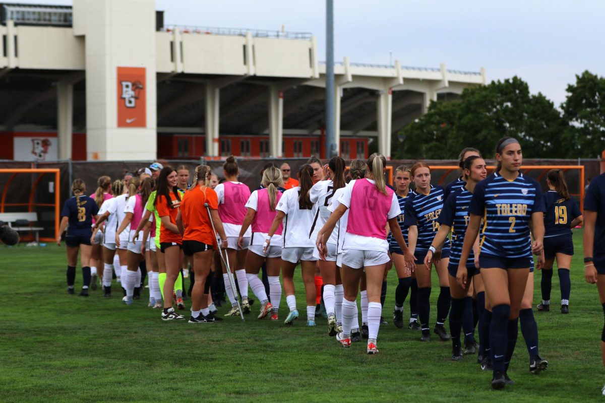 Bowling Green, OH - Falcons shaking hands with the rockets at the end of the game at Cochrane Stadium in Bowling Green, Ohio