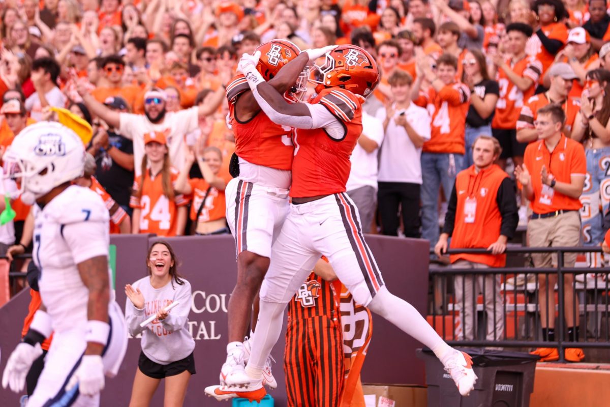 Bowling Green, OH - Falcons Senior wide receiver Jaylon Tillman (5) and junior tight end Harold Fannin Jr. (0) celebrate after scoring a touchdown at Doyt L. Perry Stadium in Bowling Green, Ohio.