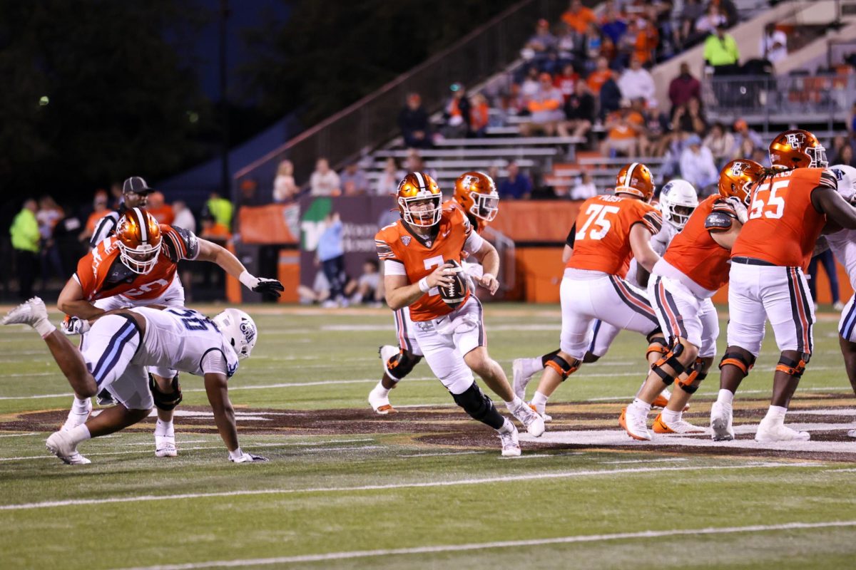 Bowling Green, OH - Falcons Senior quarterback Connor Bazelak (7) scrambles against Old Dominion at Doyt L. Perry Stadium in Bowling Green, Ohio.