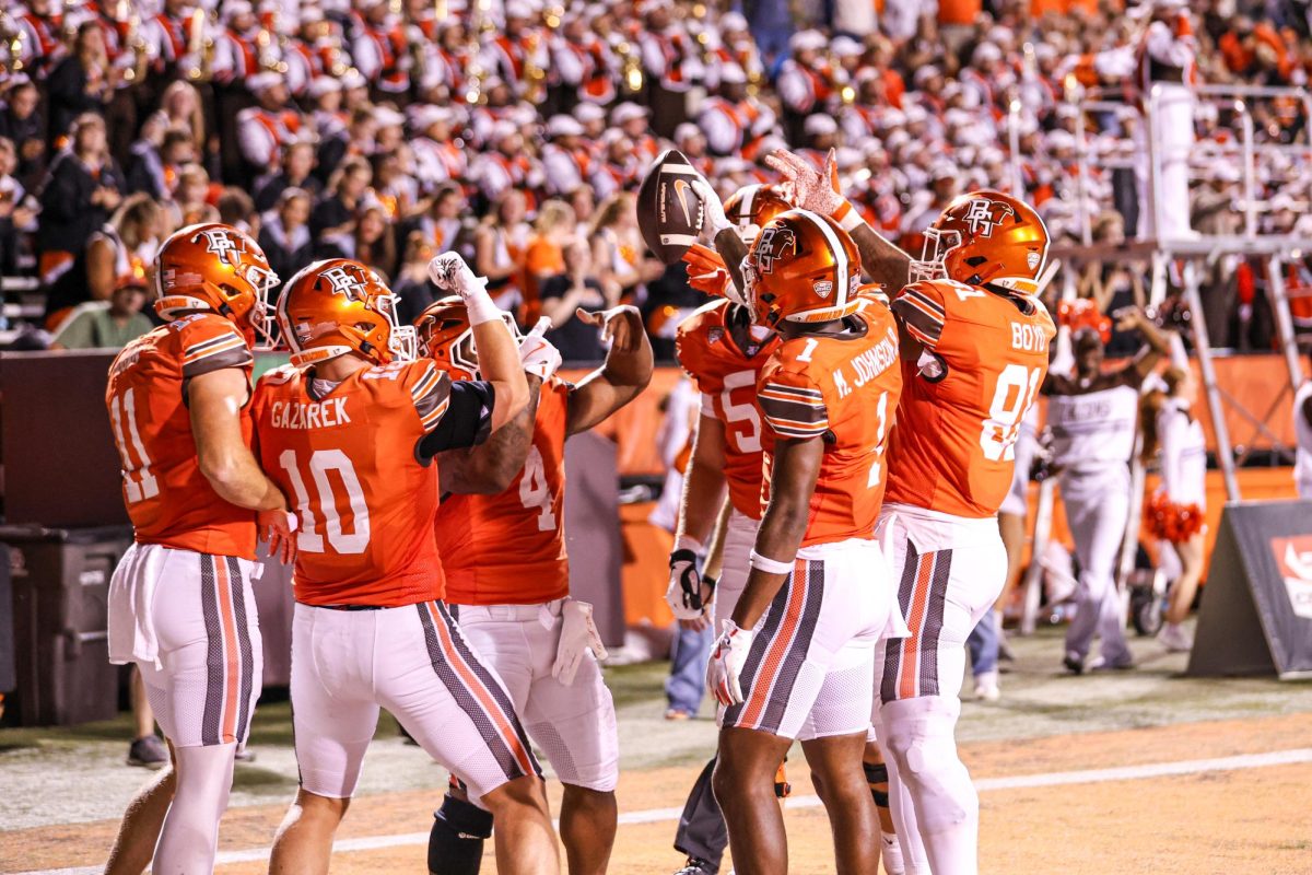 Bowling Green, OH - Falcons celebrate a touchdown late in the game against the Monarchs at Doyt L. Perry Stadium in Bowling Green, Ohio.