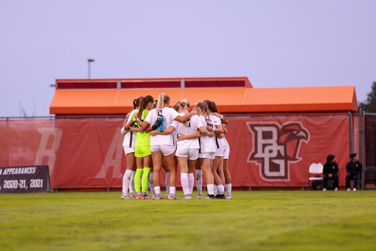 Bowling Green, OH - Falcon starters huddle prior to kickoff at Cochrane Stadium in Bowling Green, Ohio.