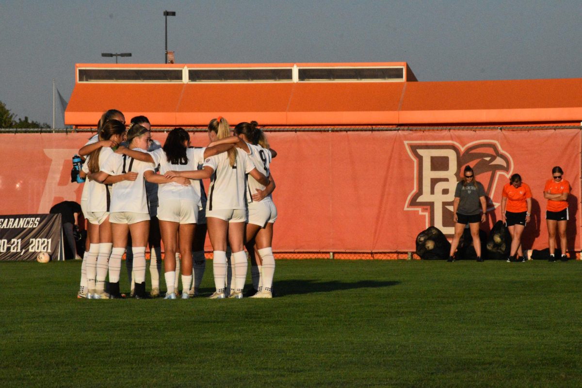 Bowling Green OH - Falcons in their pregame huddle at Cochrane Stadium in Bowling Green, Ohio.