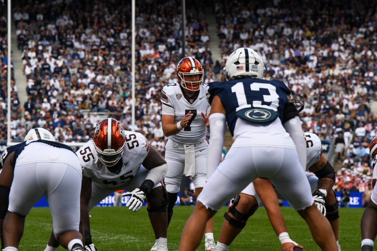 University Park, PA - Falcon senior quarterback Connor Bazelak (7) taking a snap closing in on the endzone at Beaver Stadium in University Park, Pennsylvania.