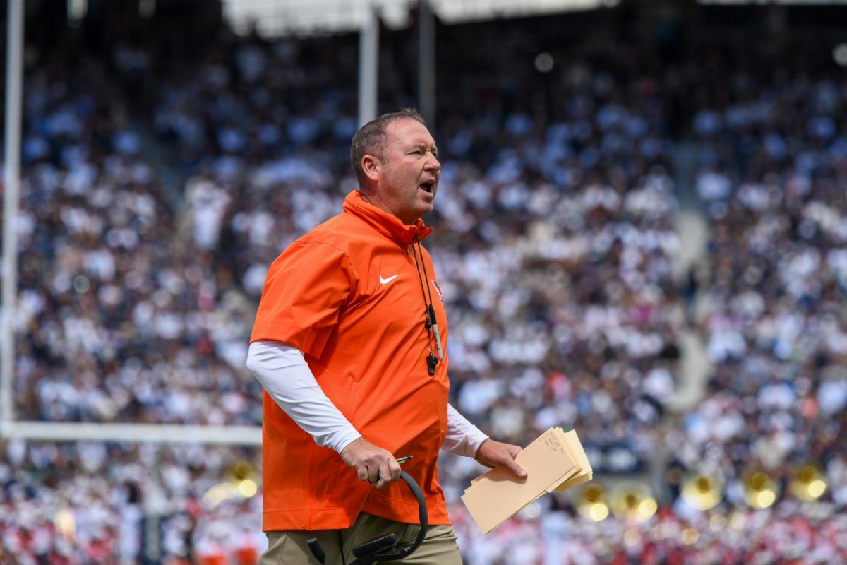 University Park, PA - Falcons head coach Scott Loeffler giving call to his players at Beaver Stadium in University Park, Pennsylvania.