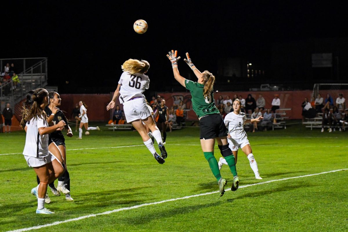 Bowling Green OH - Falcons sophomore forward Emma Stransky (32) going for a header in the box at Cochrane Stadium in Bowling Green, Ohio.