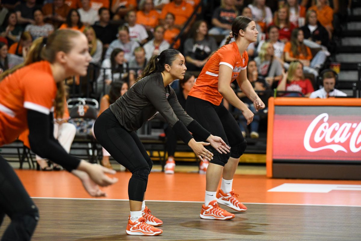 Bowling Green, OH - Falcons graduate libero Lindsey LaPinta (12) getting ready to receive the Buckeye serve at Stroh Center in Bowling Green, Ohio