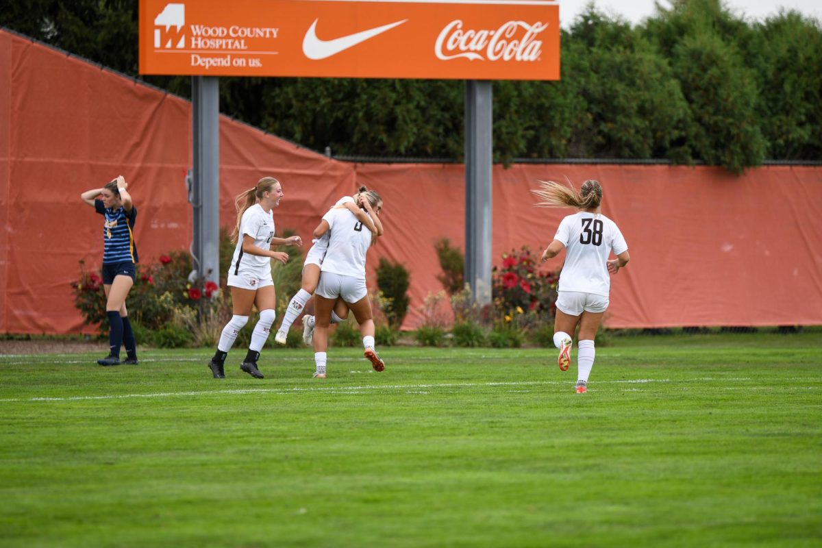 Bowling Green, OH - Falcons graduate defender Lexi Czerwien (5) celebrating after scoring the first goal for the Falcons at Cochrane Stadium in Bowling Green, Ohio