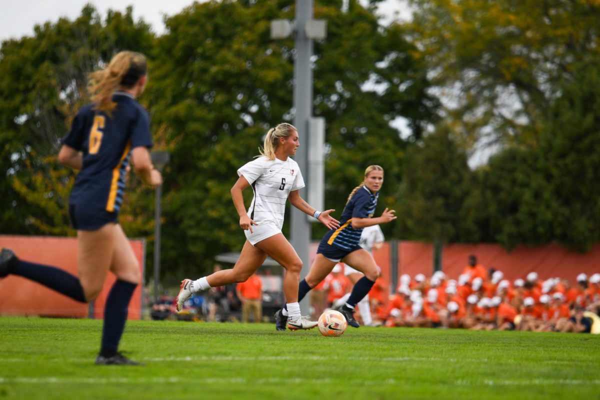 Bowling Green, OH - Falcons graduate defender Lexi Czerwien (5) racing past the Rockets defence at Cochrane Stadium in Bowling Green, Ohio