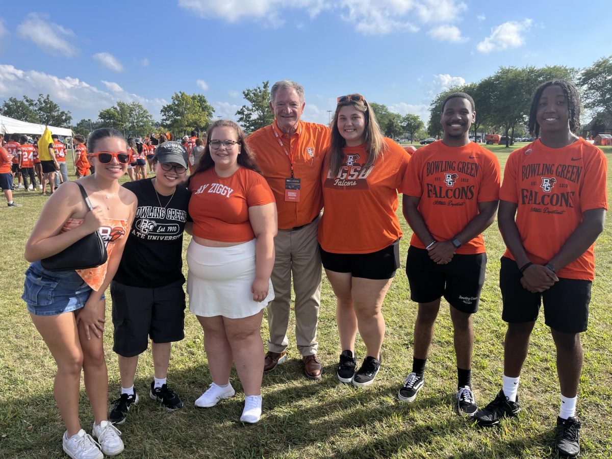 Students enjoy tailgating the game with BGSU President Rodney Rogers