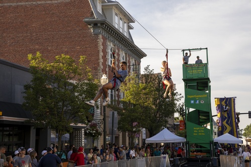 Eventgoers enjoy the annual zipline at Rally BG on Main