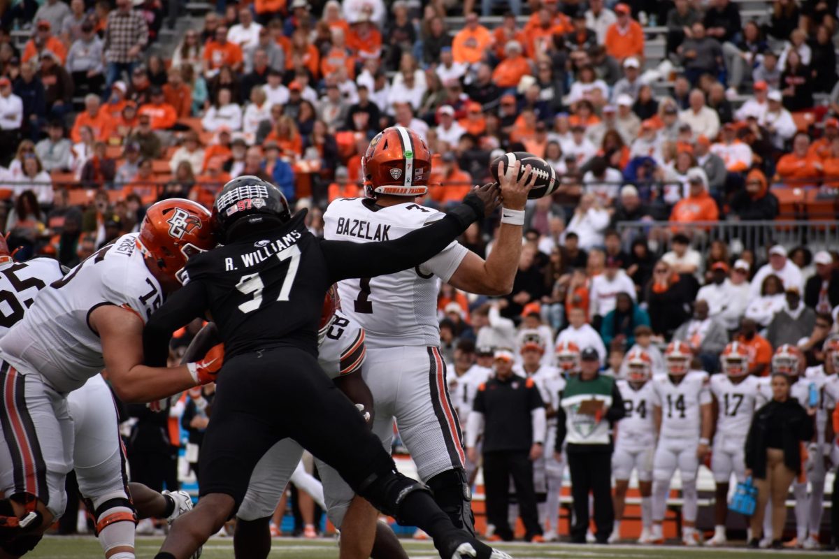 Bowling Green, OH - Falcons senior quarterback Connor Bazelak (7) throwing downfield at Doyt L. Perry Stadium in Bowling Green, Ohio.