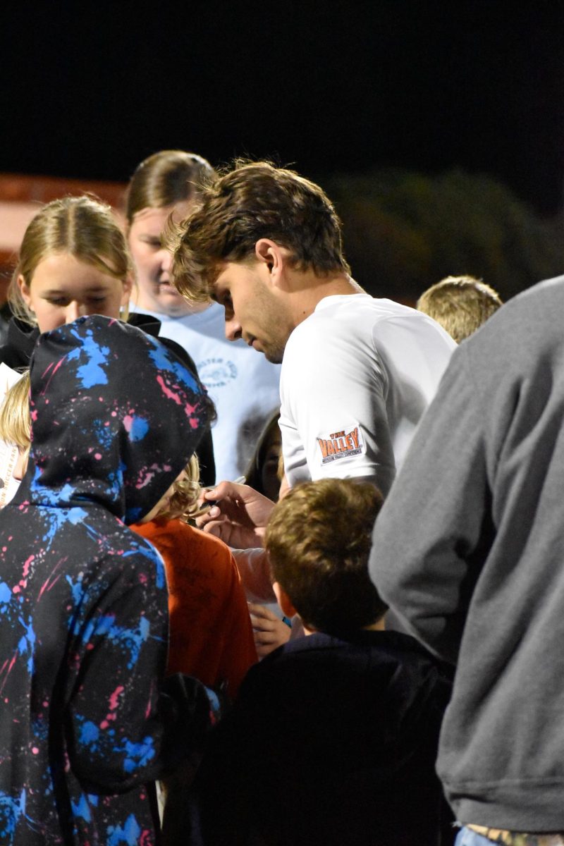 Bowling Green, OH - Falcons signing autographs for the kids after the game at Cochrane Stadium in Bowling Green, Ohio.