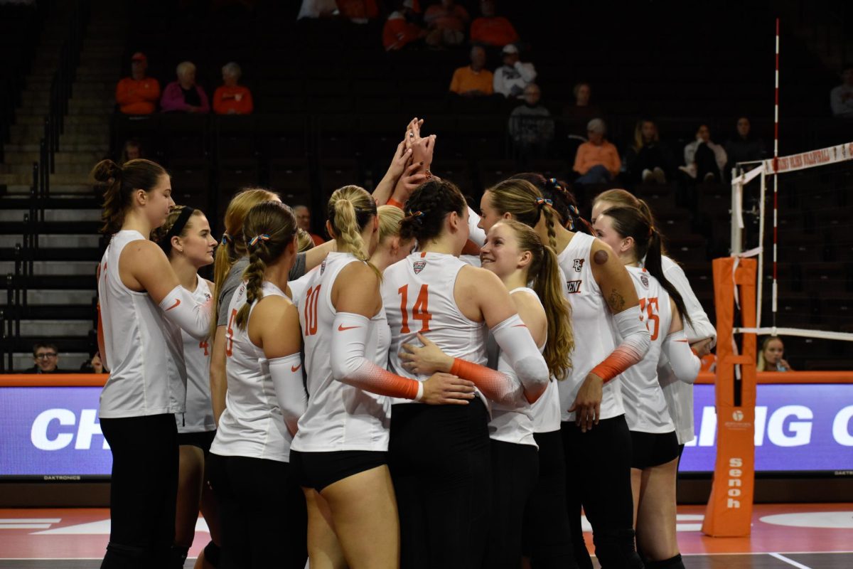 Bowling Green, OH - Falcons celebrating after taking the second set at Stroh Center in Bowling Green, Ohio.