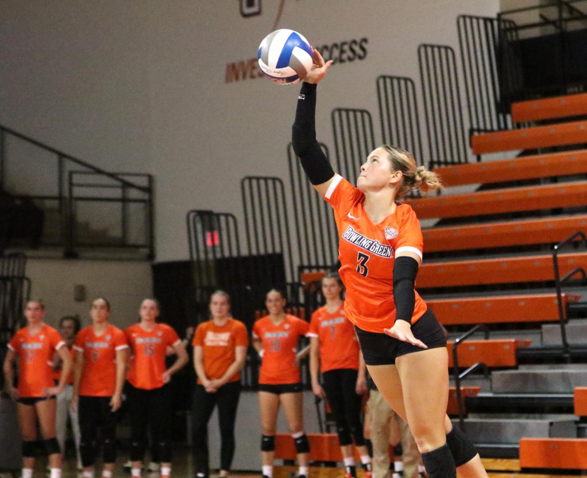 Bowling Green, OH - Falcons freshman defensive specialist Avery Anders (3) puts up a serve during a match against Western Michigan at the Stroh Center in Bowling Green, Ohio.