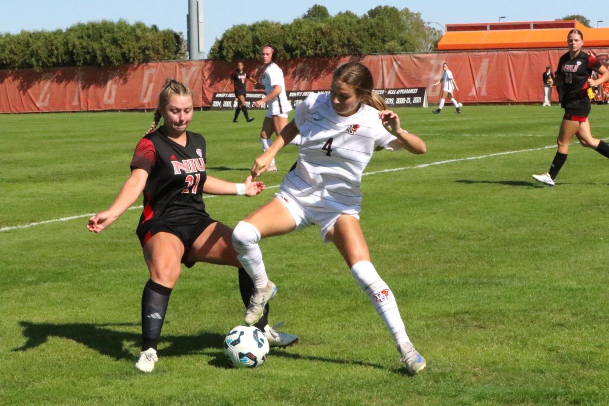 Bowling Green, OH - Falcons Sophomore midfielder Emme Butera (4) makes a move on a defender at Cochrane Stadium in Bowling Green, Ohio.