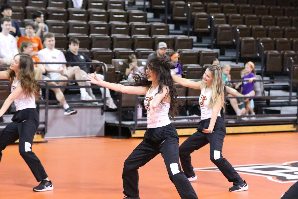 Bowling Green, OH - The BGSU Dance Team takes the floor in the transition from the second to third set at the Stroh Center in Bowling Green, Ohio.