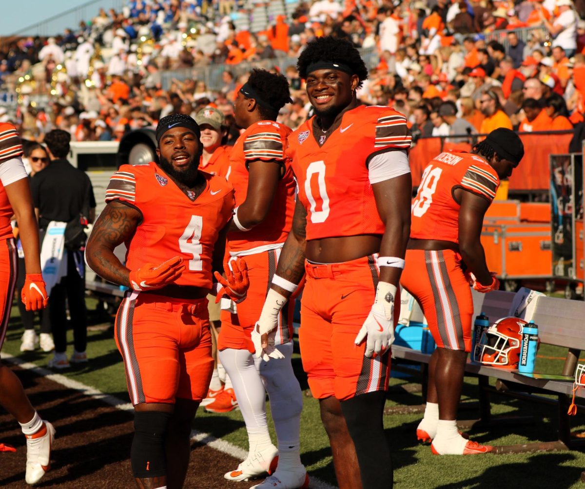 Bowling Green, Ohio- Falcons Juniors Running Back Terion Stewart (4) and Tight End Harold Fannin Jr. (0) pose for a photo before kick off against Kent State University.