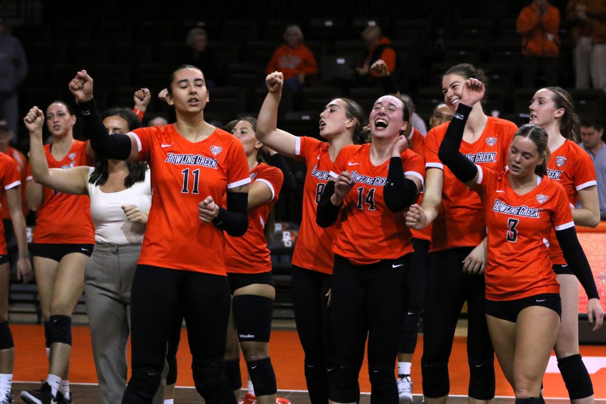 Bowling Green, OH - Falcons cheer and celebrate after defeating Kent State 3-0 at Stroh Center in Bowling Green, Ohio.