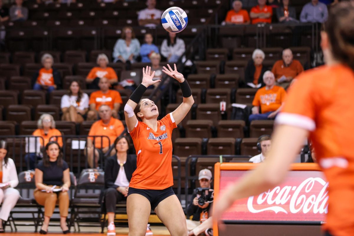 Bowling Green, OH - Freshman defensive specialist Sydnie Hernandez pops the ball up in a matchup against Western Michigan at the Stroh Center in Bowling Green, Ohio.