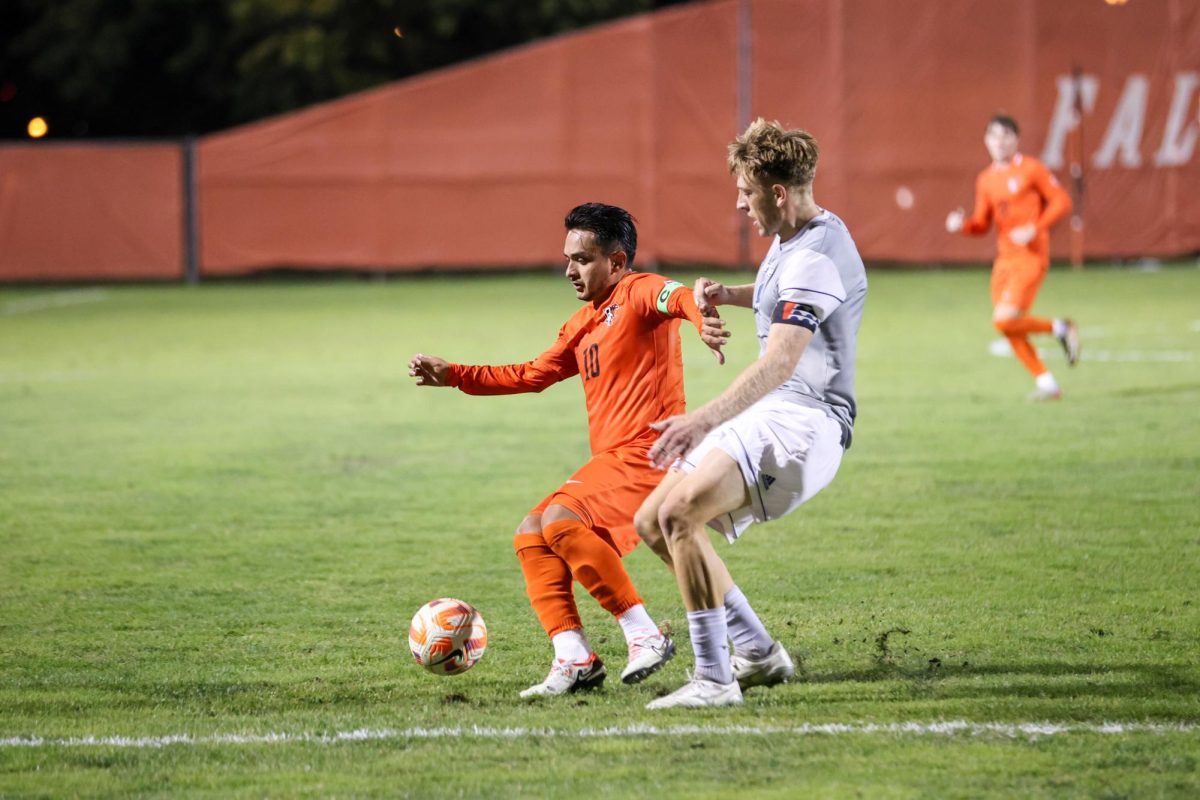 Bowling Green, OH - Falcons Senior midfielder Alberto Anaya (10) challenges a Bulldog player at Cochrane Stadium in Bowling Green, Ohio.