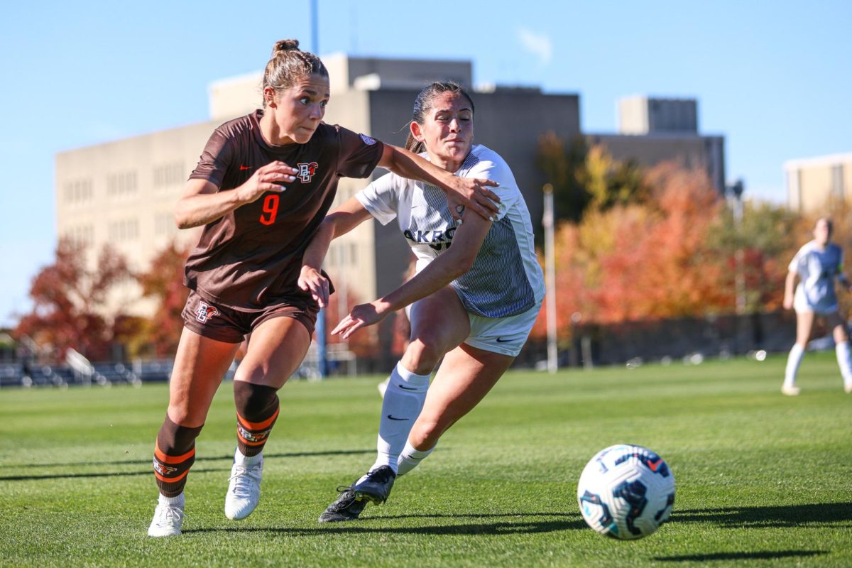 Akron, OH – Falcons junior forward Brynn Gardner (9) unites with high school teammate Akron’s sophomore midfielder Kiana Harsh (26) at FirstEnergy Stadium in Akron, Ohio.