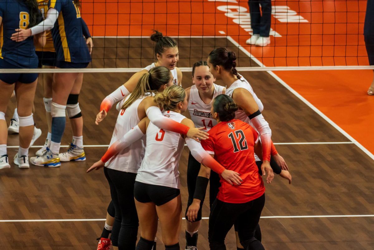 Bowling Green, OH - Falcons junior defensive specialist Avery Anders (3) receives a serve from the Golden Flashes at the Stroh Center in Bowling Green, Ohio.