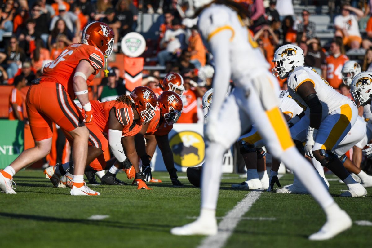 Bowling Green, OH - Falcons defensive line fighting off against the Golden Flashes at Doyt L. Perry Stadium in Bowling Green, Ohio.