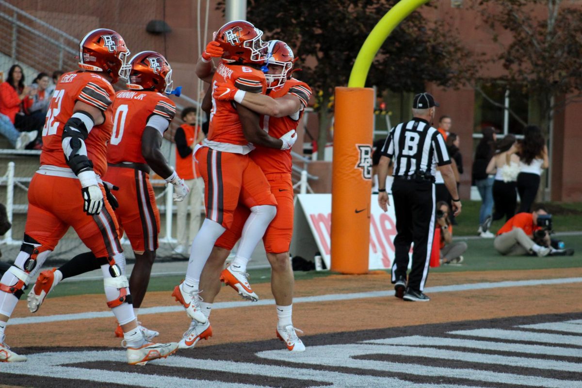 Bowling Green, OH - Falcons celebrates in the endzone after a touchdown by junior running back Jamal Johnson (6) at Doyt L. Perry Stadium in Bowling Green, Ohio.