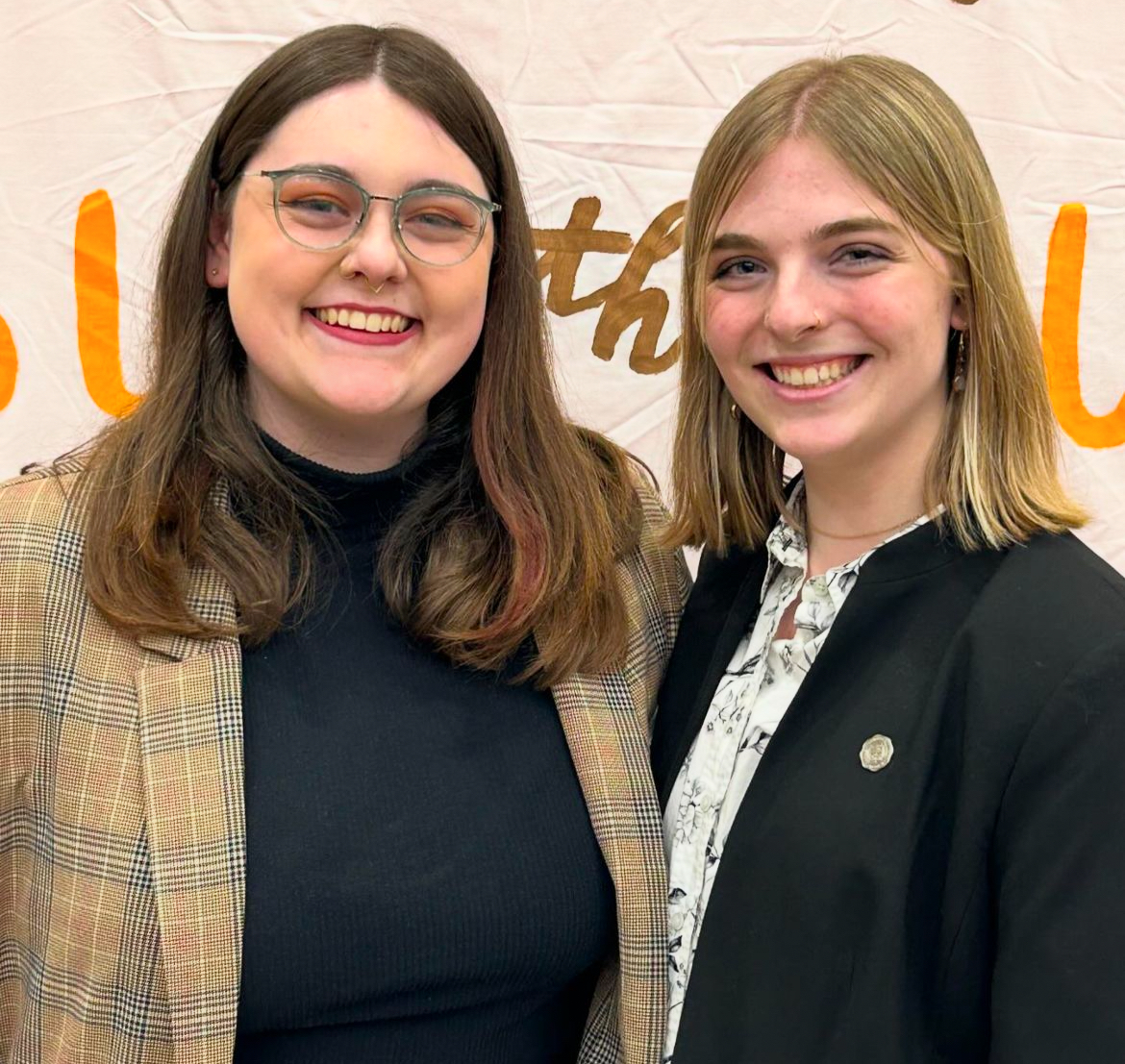 Current  Undergraduate Student Government (USG) President Elyse Adrian and former USG President Heidi Gasser