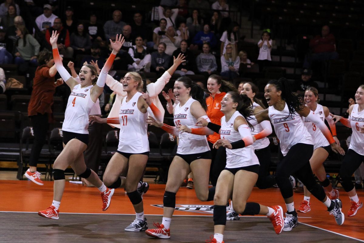 Bowling Green, OH - Falcons storming the court after taking the final set at the Stroh Center in Bowling Green, Ohio.